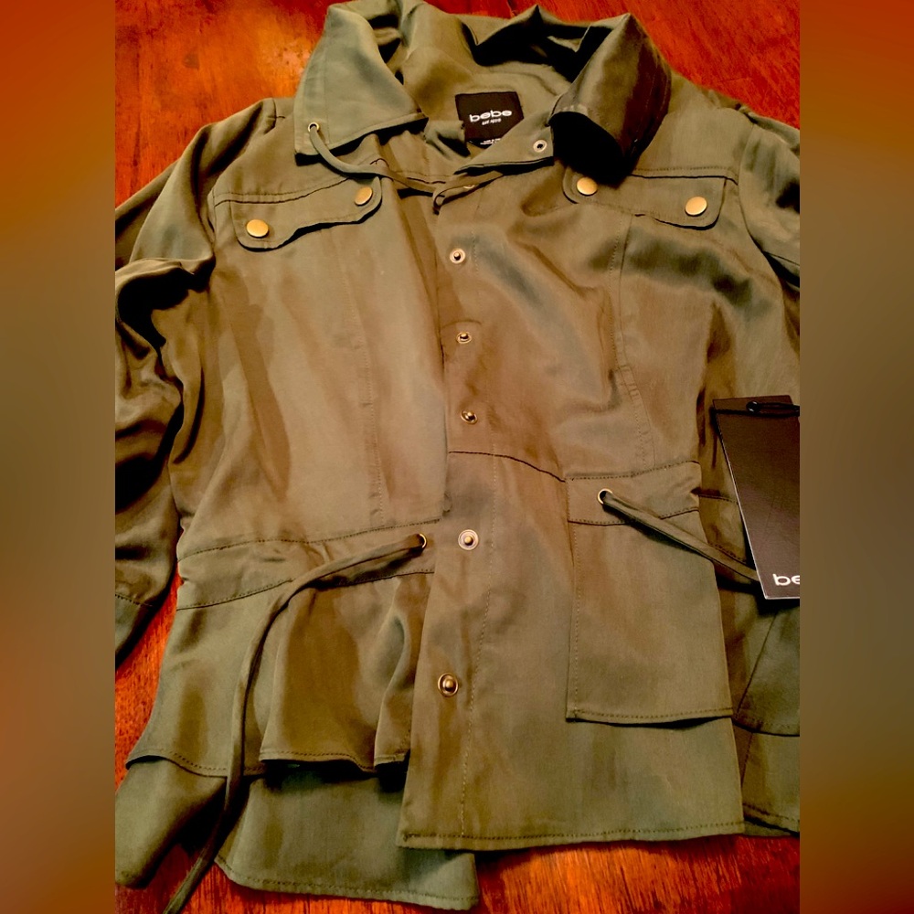 Brand new rare and collectible Bebe khaki jacket size Large, beautiful fabric